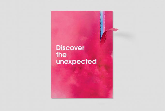 Discover the unexpected’ written in white in front of a pink cloud of smoke on direct mailer