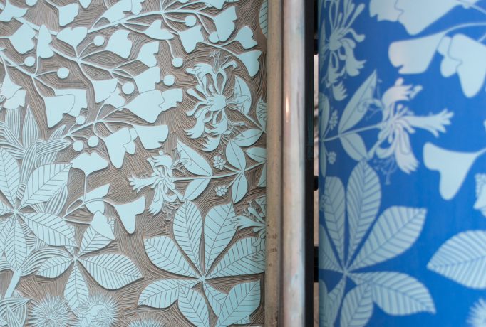 close up at a lino roll with the cutted out design and the printed design