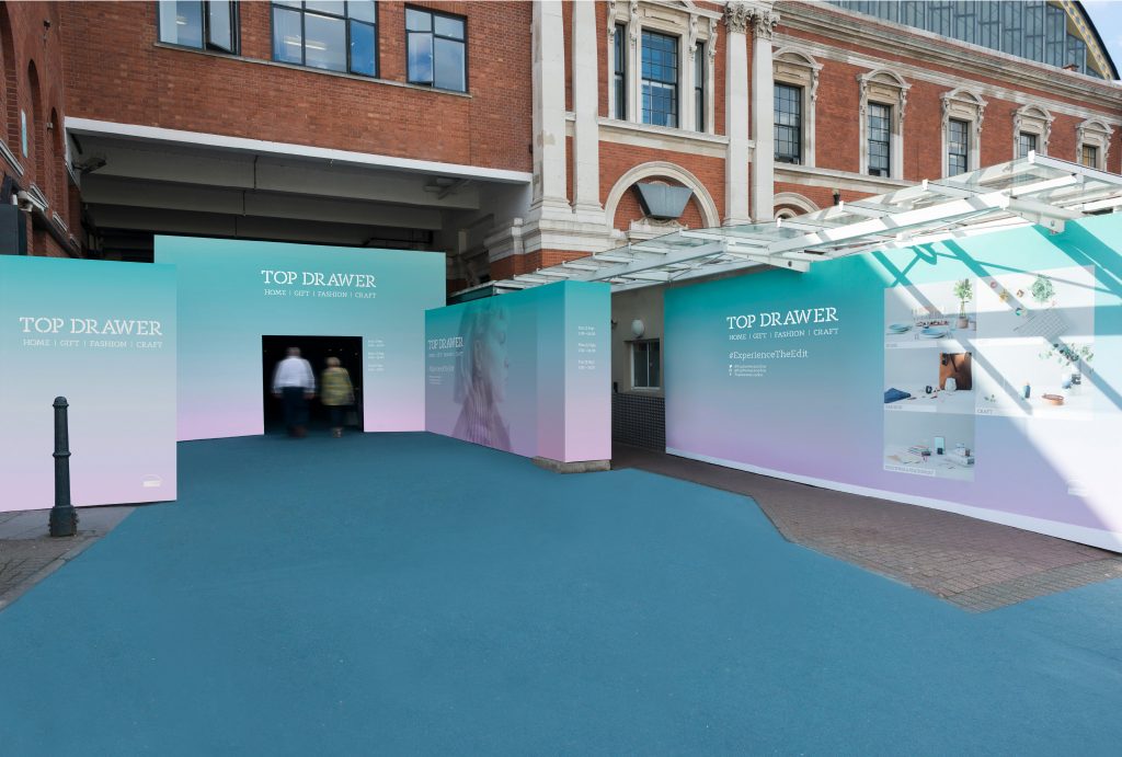 entrance design for the Top Drawer exhibition in turquoise and pink