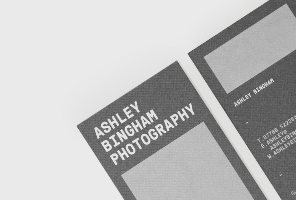 close up at dark grey stationery with light grey boxes and written ‘ASHLEY BINGHAM PHOTOGRAPHY’